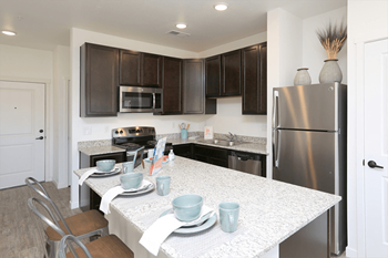 Stainless steel kitchen appliances - microwave, range, dishwasher & refrigerator